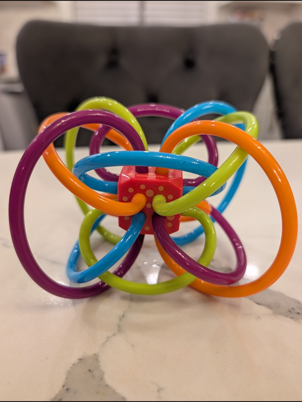 Manhattan Baby Teether & Sensory Toy - Purple, Blue, Green, Orange